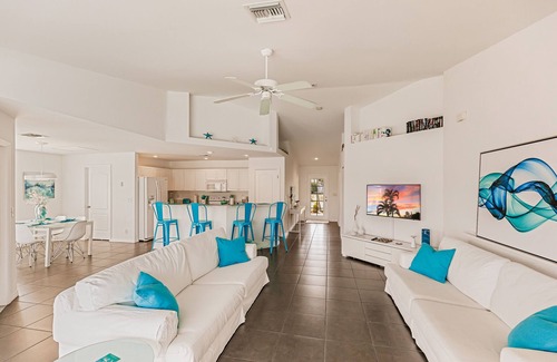 Trafalgar House | Beautiful Cape Coral Home, Outdoor Oasis with Heated Pool on a Freshwater Canal!