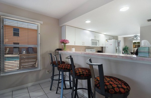 Pelican Apartment | Beautiful complex on Lake Louise private pool and pier