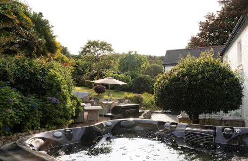 Mabe House | Beautiful Country Farmhouse Set In A Stunning Woodland With Pool, Sauna & Parking at 'The Old Farmhouse'