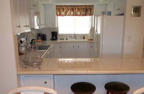 McGregor Condo | Beautiful end unit on the golf course and next to the pool