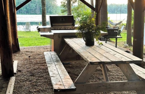 Orange House | Beautiful Fall Foliage Waterfront Fire Pit