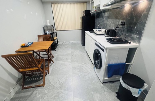 Hammond Park House | Beautiful Family room with newly renovated bathroom and Kitchenette.
