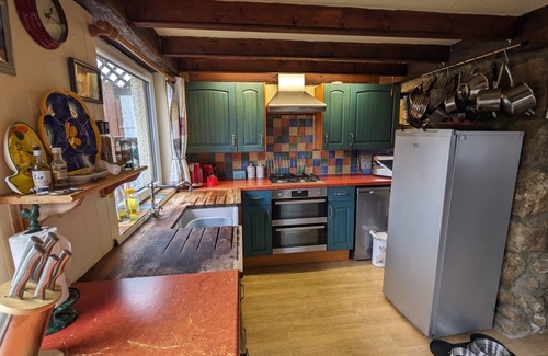 Saint Erth Praze House | Beautiful granite cottage with parking and garden. Near the coast. Dogs welcome.