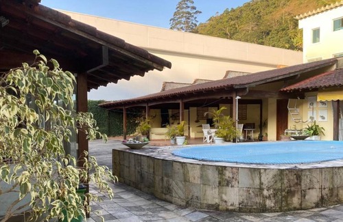 Duques House | Beautiful house near the Quitandinha Palace, with swimming pool and leisure area.