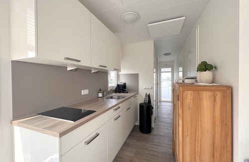 Kerkdriel Boat Rental | Beautiful houseboat in Kerkdriel harbour