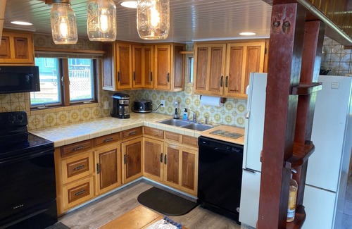 Herron Cottage | Beautiful lakefront home directly on Hubbard Lake, East Shore