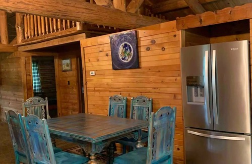 Branch Cabin | Beautiful Log Cabin 11ac. 4 br. 2.5 ba. on snowmobile trails in Manistee forest.