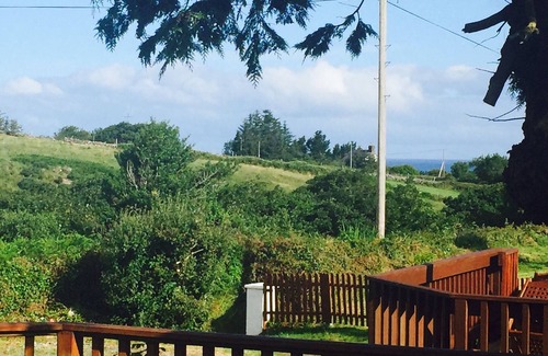 Camp House | Beautiful log cabin, nestled in the quiet mountains overlooking the sea