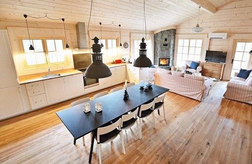 Vaxtorp Cabin | Beautiful luxury log cabin. Two private terrasses. Open fireplace. Pet friendly