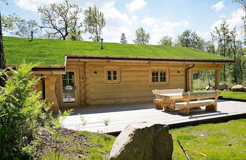 Vaxtorp Cabin | Beautiful luxury log cabin. Two private terrasses. Open fireplace. Pet friendly