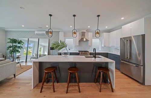 The Heights House | Beautiful Modern 4BR Duplex W/Rooftop NYC views