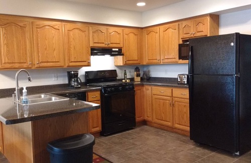 Iron River House | Beautiful newer home on the sunny side of peaceful Camp Lake in Iron River