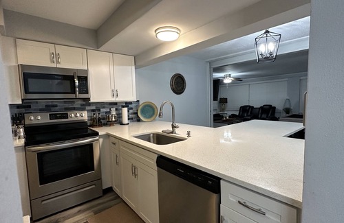 Lochmoor Waterway Estates House | Beautiful North Fort Myers Home w/Hot Tub & Boat Lift