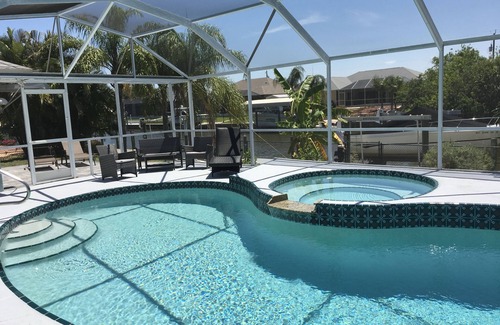 South Gulf Cove House | Beautiful relaxing waterfront home with pool, spa and boat dock.
