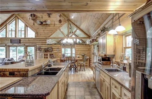 Trego House | Beautiful spacious secluded log home located feet from ATV/snowmobile Trails