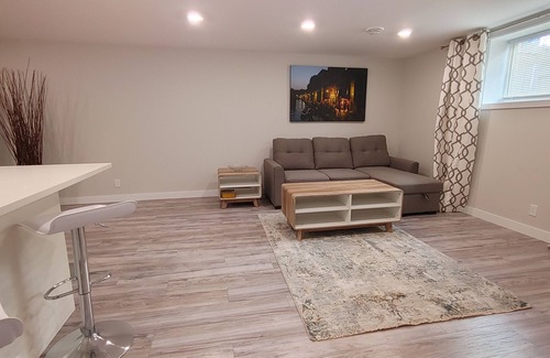 Southwest Calgary House | Beautiful two bedroom and an office lower level suit
