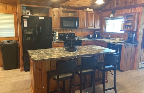Canada Creek Ranch House | Beautiful Up North Lake Front Home on All Sports Clear Lake with BOAT Rental!