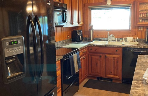 Canada Creek Ranch House | Beautiful Up North Lake Front Home on All Sports Clear Lake with BOAT Rental!