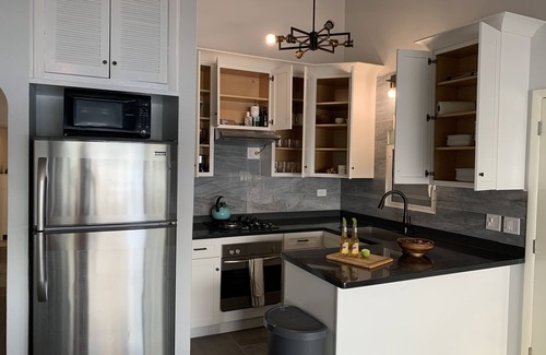 Cupecoy House | Beautiful Waterfront Apartment. Newly remodels