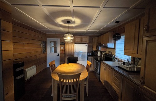 Nominingue Ski Chalet | Beautiful waterfront with beach and spa!