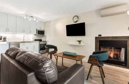 Orchard District Condo | Beautifully Remodeled top floor condo with two balconies, a fireplace and BBQ!
