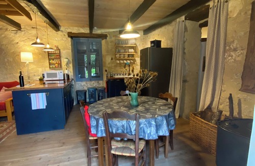 Touzac House | Beautifully renovated traditional riverside cottage, withnlarge private garden.