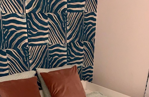 Verviers House | Bedroom and small private bathroom.