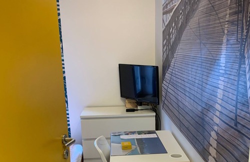 Verviers House | Bedroom and small private bathroom.