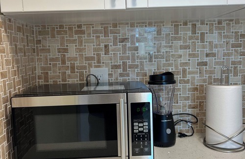 Greater Northdale Apartment | Bellagio a modern , spacious unit with a large balcony facing a golf course