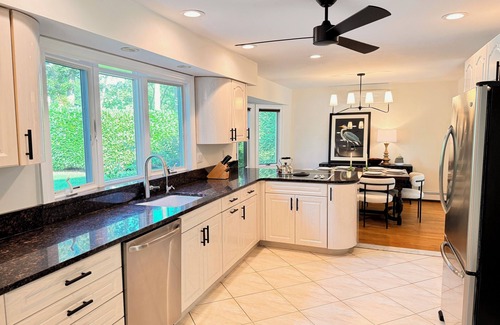 Bellport House | Bellport Bliss: Pool and Relaxing Spaces