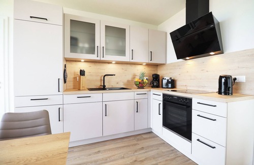 Marienleuchte Apartment | BeltBlick 11 - Roof terrace. Sauna. Pure sea view.