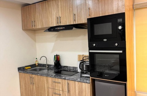 Ikeja Apartment | Benitonite-Charming 1-bedroom apartment in welcoming Lagos with AC