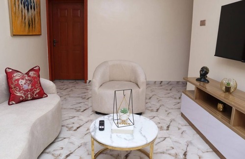 Ikeja Apartment | Benitonite-Charming 1-bedroom apartment in welcoming Lagos with AC