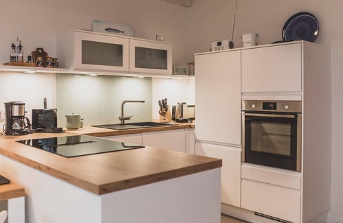 Rysum Apartment | "Bente" cozy maisonette apartment with terrace in the historic Gulfhof