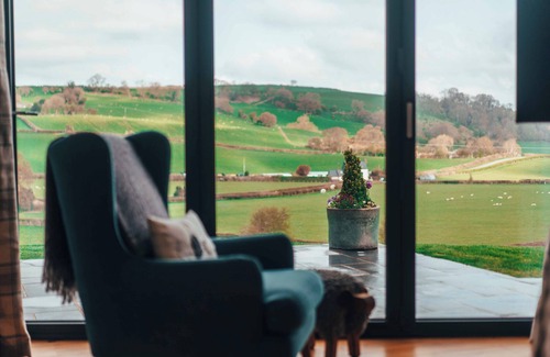 Montgomery House | Bespoke countryside retreat sleeping 4. Pet friendly with a hot tub and BBQ.