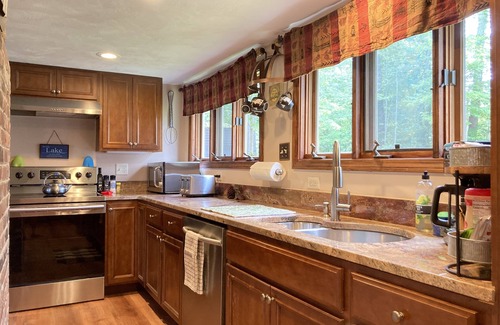 Lochmere Cottage | Big Pine Lakefront Cottage with Dock, Fire Pit & BBQ