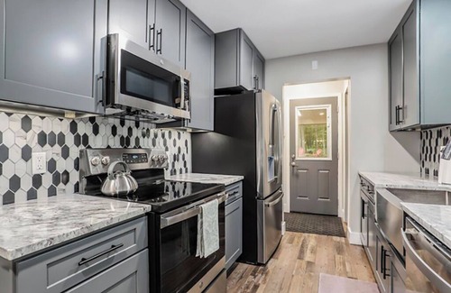 Canadian Lakes House | Big Red! Modern clubhouse with Hot Tub! Walking distance to Castle - 4 bedrooms