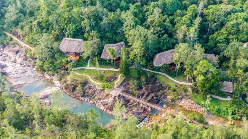 Blancaneau Cabin | Blancaneaux Lodge by Francis Ford Coppola