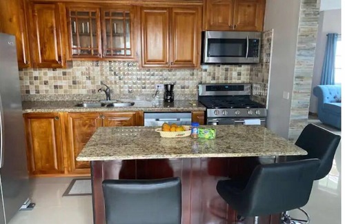 Molynes Gardens Condo | Bliss on the Hill - modern, spacious, and centrally located in Kingston!