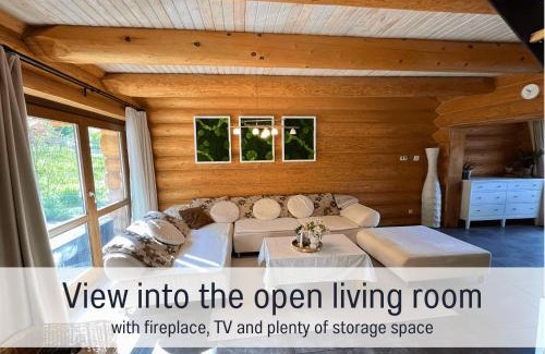 Laslea Apartment | Blockhaus Malmkrog with garden, bright rooms, and an open kitchen