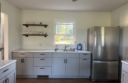Hope House | Blue's Pad.nA charming and cozy 2-bedroom house on Wixom Lake in Beaverton, MI