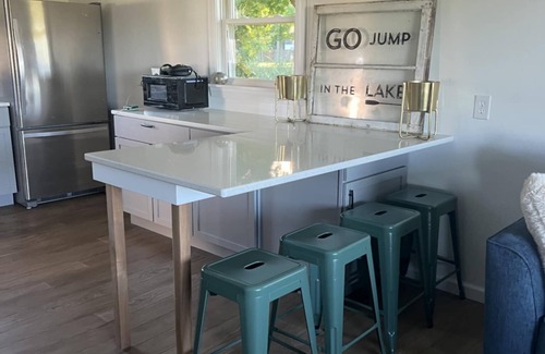 Hope House | Blue's Pad.nA charming and cozy 2-bedroom house on Wixom Lake in Beaverton, MI