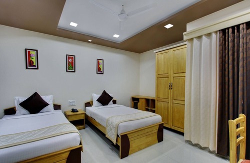 Koramangala Hotel | Bluemoon Comforts
