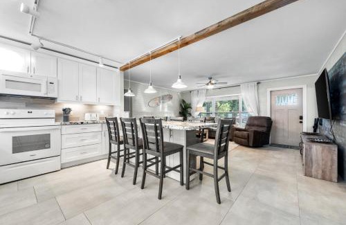 Boynton Beach House | Boho Tiki Villa w Heated Saltwater Pool, King Beds & 6TVs