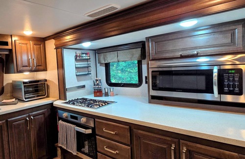 Boyne City House | Book Your Adventure in this Ultra Comfy, Luxury RV on 10 Acres. Bring your Pup!