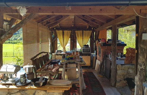 Kulen Vakuf Apartment | Bosnian house next to the Una river, with a view of the old Ostrovica fortress