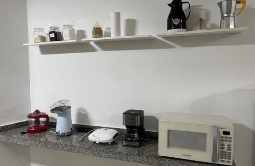 Praia do Pontal da Cruz Apartment | Enjoy relaxing moments with your family in our cozy space.