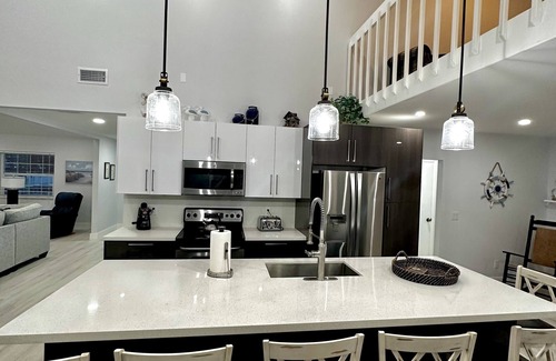 Gulf Cove House | Breath taking canal, pool home with golf access. 15 minutes from beaches.