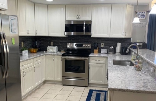 Crisfield Condo | Breathtaking Penthouse Waterfront Condo with Wrap Around Balcony and Boat Slip