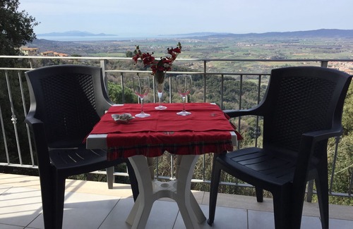 Gavorrano Apartment | Bright apartment with beautiful sea view and 50 m2 rooftop terrace,